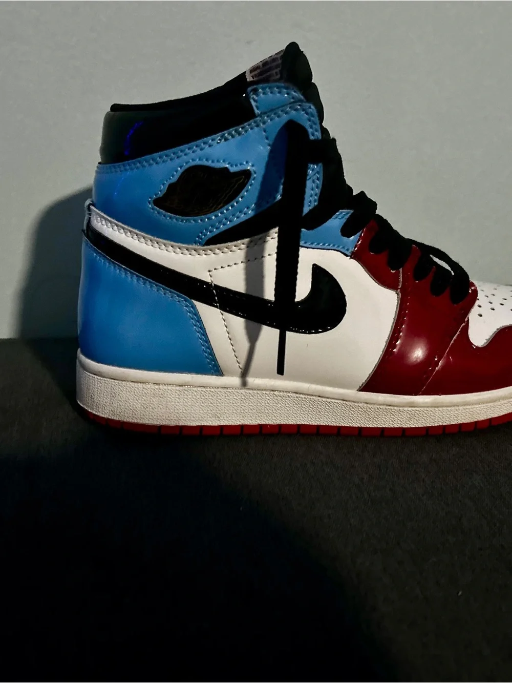 Nike Jordan 1 High-Top Sneaker in Red White Blue with Black Swoosh